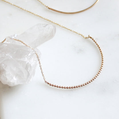dot beaded arc necklace