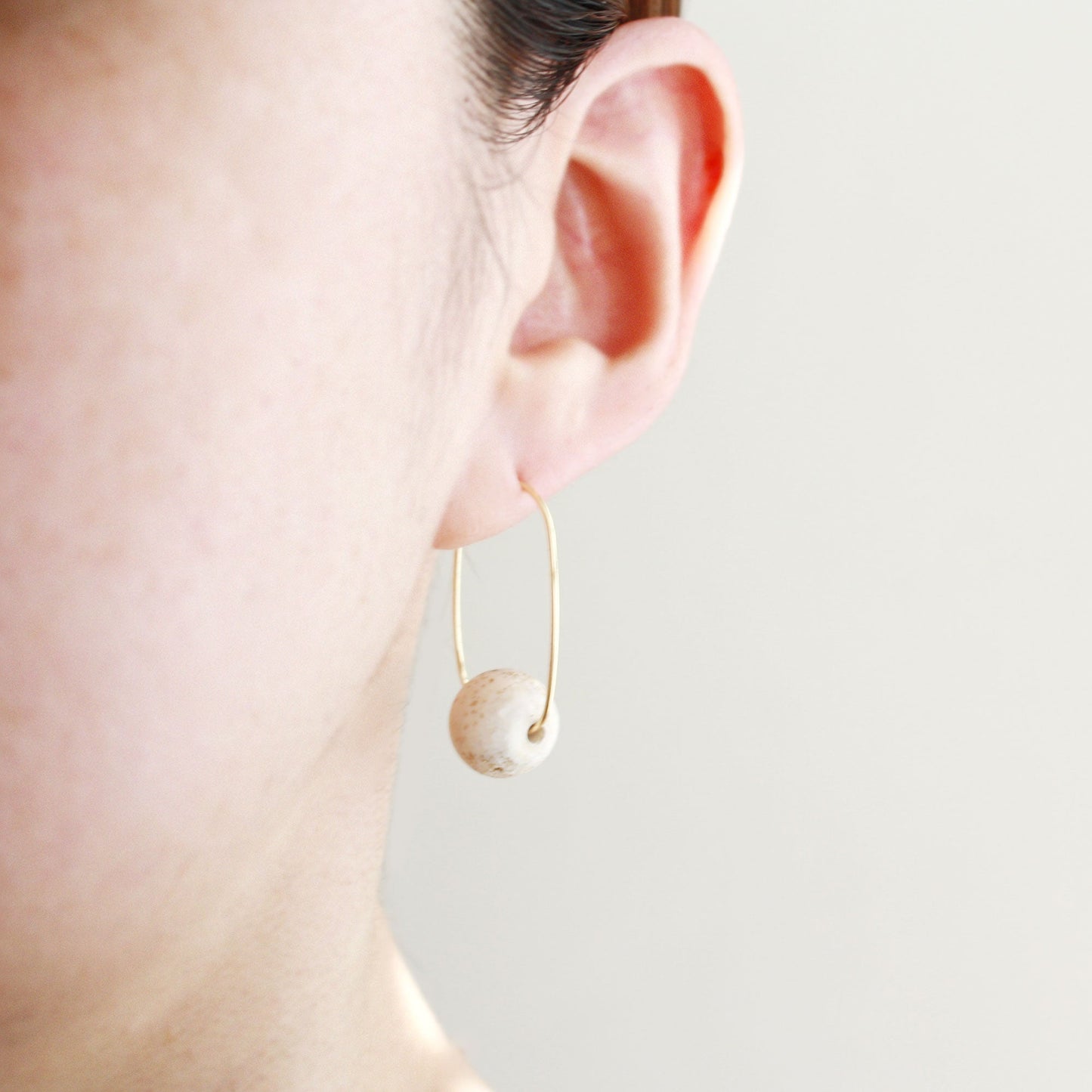 Oval Hoop Earrings with Small Black Balls